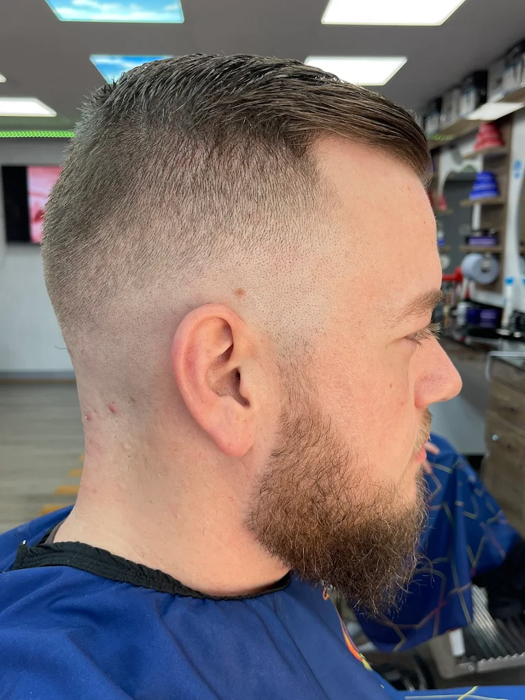 Skin fade with a sculpted full beard, a Best Cut Barbers client